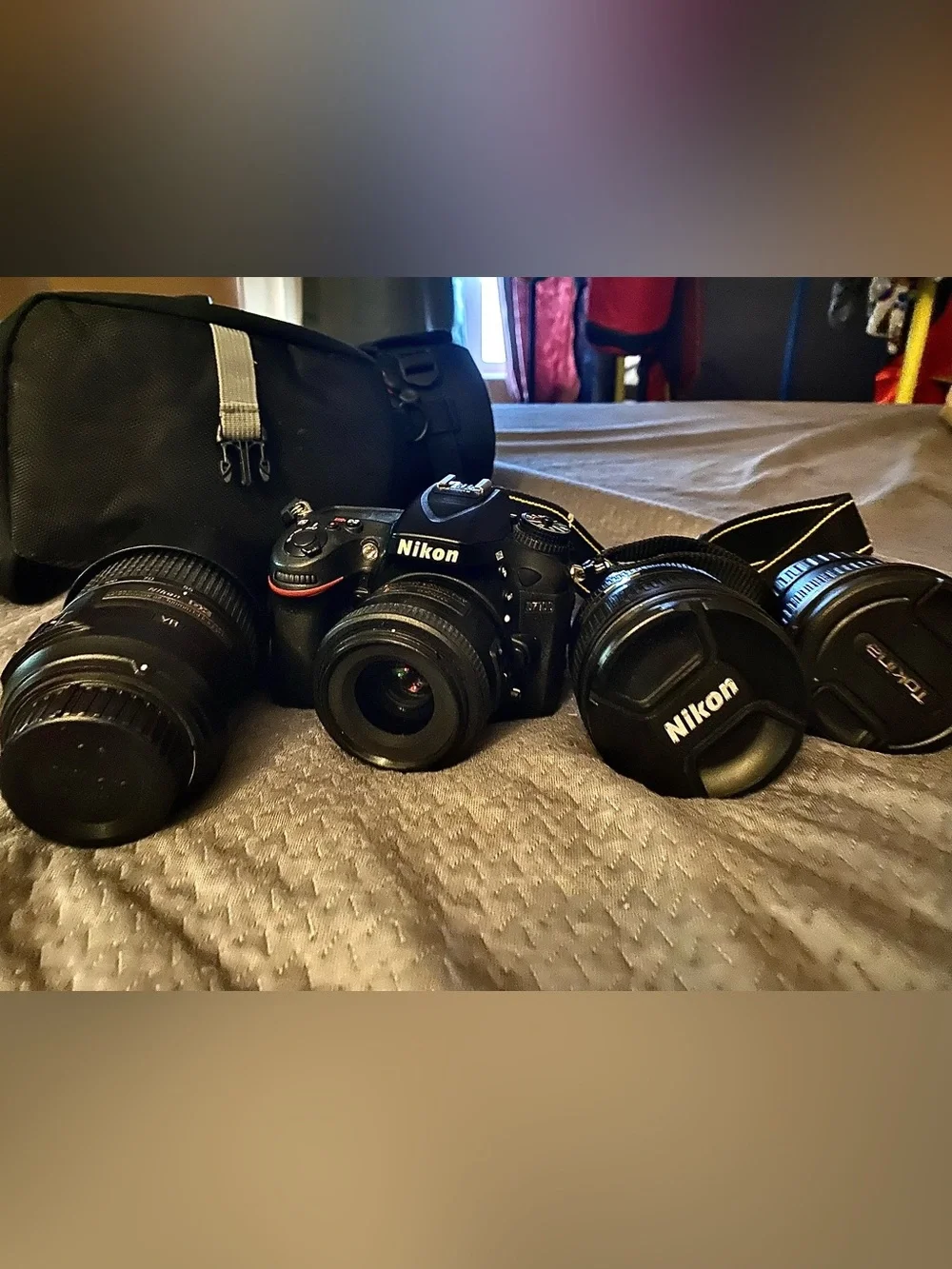 Nikon Black DSLR Camera Body with Three Black Interchangeable Lenses